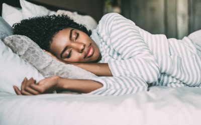 Women sleeping in a bed.